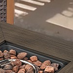 gray cushion/brown wicker