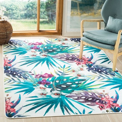 Ivory and Green Tropical Floral Synthetic Area Rug, 5' x 7'