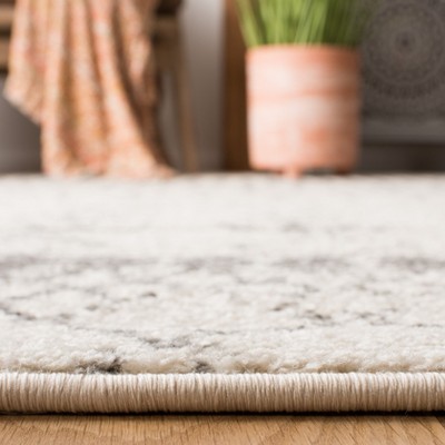 Ivory and Grey 9' Square Synthetic Area Rug
