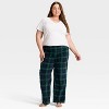 Women's Plaid Microfleece Holiday Matching Family Pajama Pants - Wondershop™ Navy Blue - 3 of 4