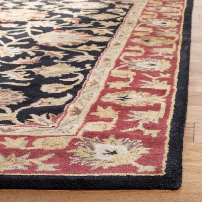 Elegant Heritage Hand-Tufted Black Wool Rectangular Rug 6' x 9'