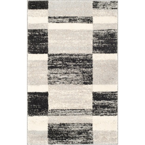 Black Indoor-Outdoor Unbound Carpet Area Rug