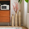 Angel Sar Set of 3 Gold Metal Vases with Vine Patterns, High Distress Metal Centerpiece Vases for Home Decor, 34", 29", 25" H Tall Floor Vases - 2 of 4