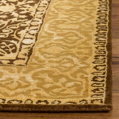 Brown and Ivory Round Tufted Wool Area Rug