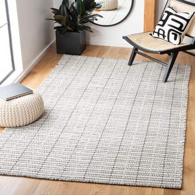 Handmade Black and Ivory Wool Tufted Rectangular Area Rug, 4' x 6'