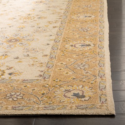 Ivory and Beige Rectangular Synthetic 6' x 9' Area Rug