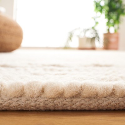 Artisan-Crafted Light Beige 4' x 6' Handwoven Wool Area Rug