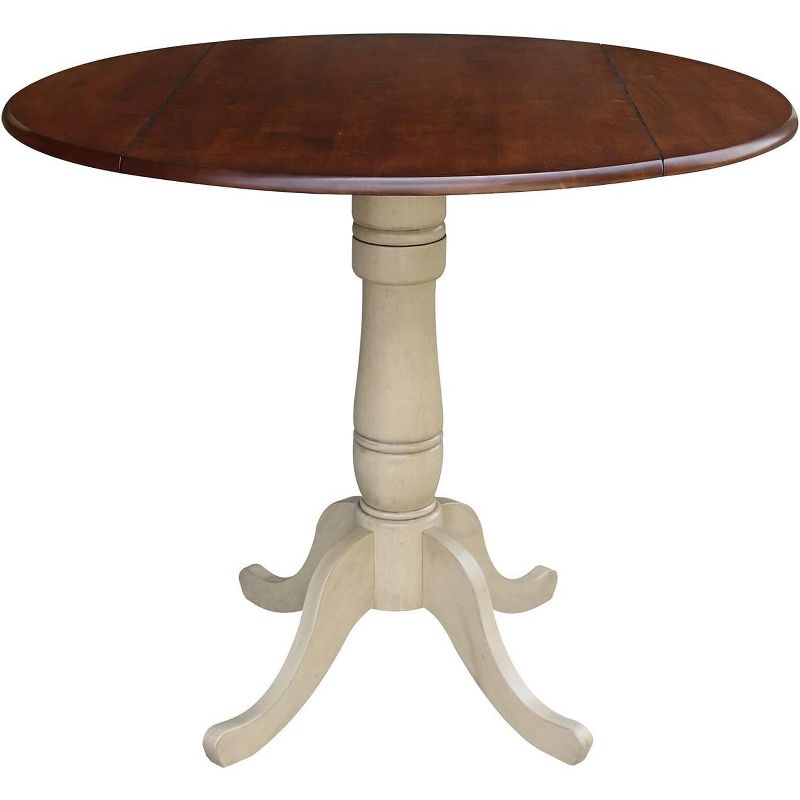 International Concepts 42 inches Round Dual Drop Leaf Pedestal Table - 35.5 inchesH, Almond/Espresso Finish, 1 of 2