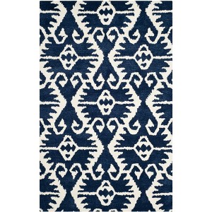 Wyndham WYD323 Hand Tufted Indoor Rugs - Safavieh - 1 of 4