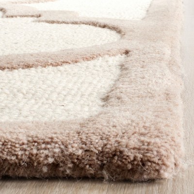 Hand-Tufted Beige/Ivory Wool 6' x 9' Area Rug