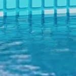 brown rattan/grey cushion