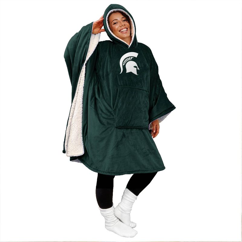 NCAA Michigan State Spartans Team Color Bloncho with Logo Patch and Faux Shearling Inside Throw Blanket, 1 of 4