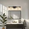 DORESshop 28 in. 4-Light Modern Black and Gold Bathroom Vanity Light with Clear Glass Shades for Bathroom, Bedroom, and Hallway - 4 of 4