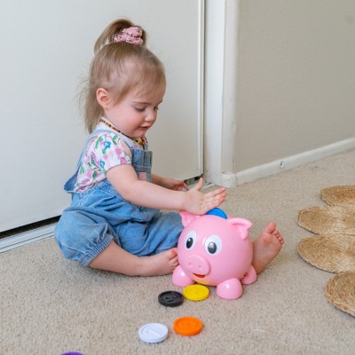 Interactive Pink Piggy Bank with Colorful Number Coins