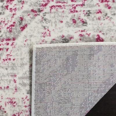 Ivory and Pink Medallion Synthetic 5' x 7' Area Rug