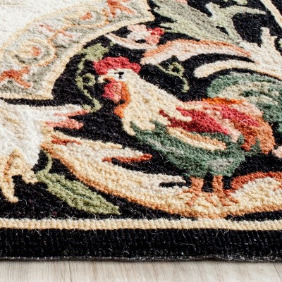 Ivory and Black Floral Wool Hand-Hooked Area Rug
