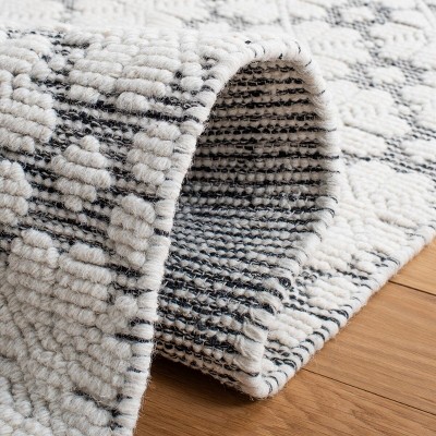 Ivory and Black Hand-knotted Wool 4' x 6' Shag Rug