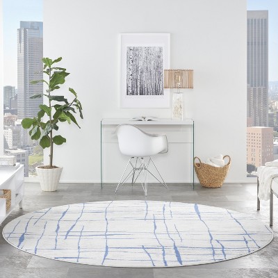 Whimsicle Blue and Ivory Abstract Round 8' Area Rug