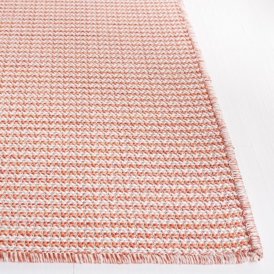 Beige and Terracotta Tufted Rectangular Synthetic Rug