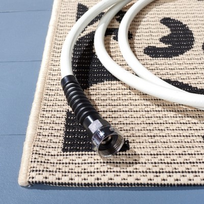 Sand and Black Floral Motif Synthetic Runner Rug