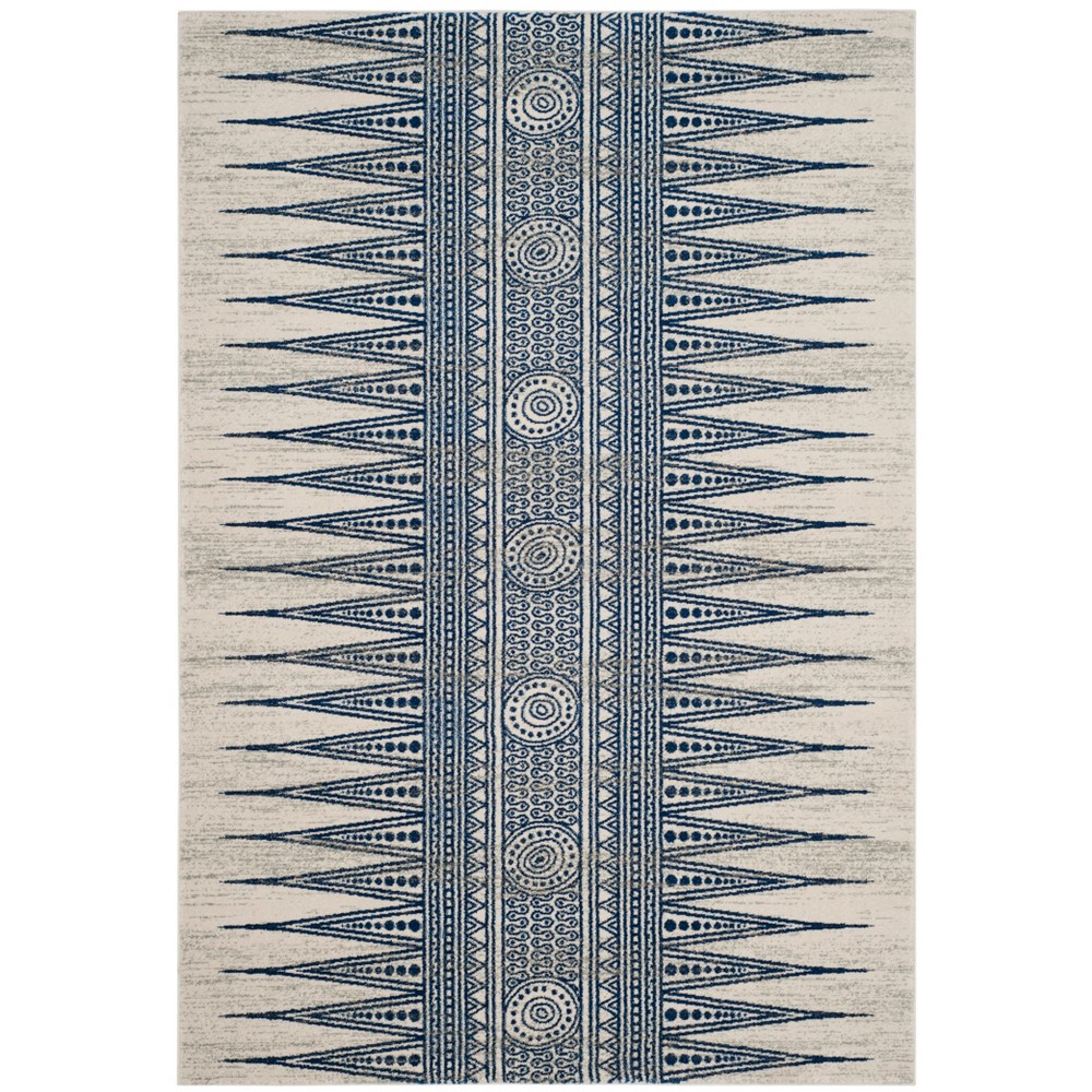 6'7inx9' Geometric Design Loomed Area Rug Ivory/Blue - Safavieh