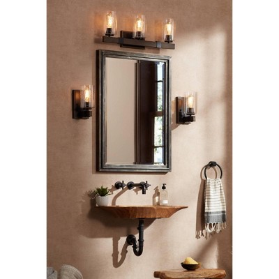 Bronze and Wood Grain Industrial Wall Sconce with Seedy Glass Shade