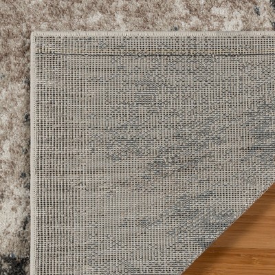 Blue and Beige Tufted Rectangular 5' x 7' Synthetic Area Rug