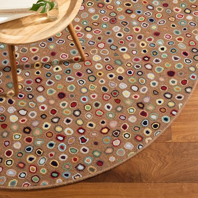Handmade Ivory and Multicolor Geometric Wool Area Rug