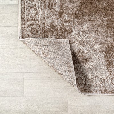 Ivory and Brown Medallion Synthetic 8' x 10' Area Rug