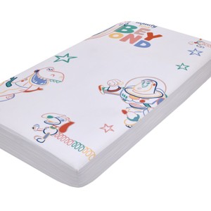 NoJo Disney Toy Story Green, Red, Blue and White "To Infinity and Beyond" Color Crazy Nursery Photo Op Fitted Crib Sheet - 1 of 4