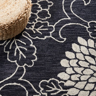 Handmade Black and Ivory Floral Wool Area Rug 3' x 5'