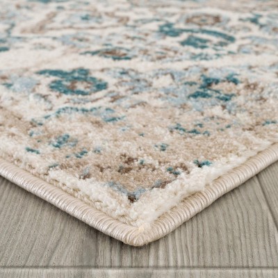 Cream and Blue 4' x 6' Synthetic Oriental Area Rug