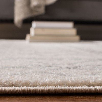 Ivory and Grey Round Synthetic Easy Care Area Rug, 9' x 9'