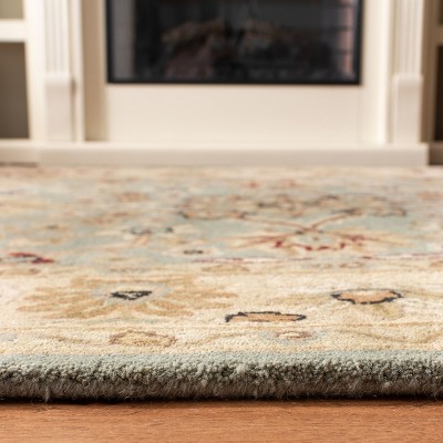 Heritage Elegance Off-White Tufted Wool Accent Rug 24" x 4"