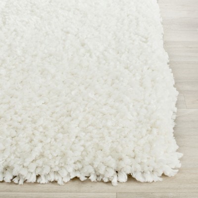 Ivory Hand-Tufted Shag Wool and Synthetic Area Rug 4' x 6'