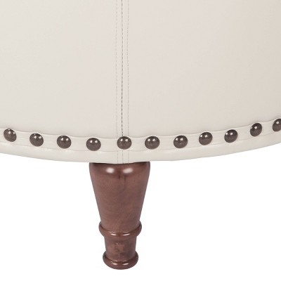 Alloway Cream Faux Leather Round Storage Ottoman with Antique Bronze Nailheads