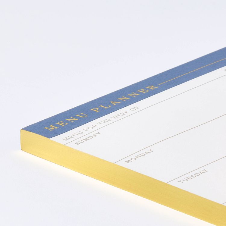 A menu planner with a blue and yellow colored border, featuring sections for each day of the week.