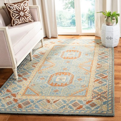 Handmade Blue and Beige Wool Tufted 6' x 9' Area Rug