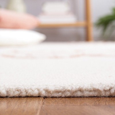 Ivory and Pink Floral Hand Tufted Wool Area Rug 8' x 10'