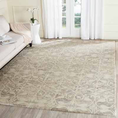 Off-White Handmade Wool Tufted Rectangular 6' x 9' Area Rug