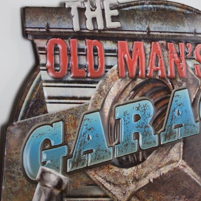 Vintage Metal Garage Sign with Tools and Bold Lettering