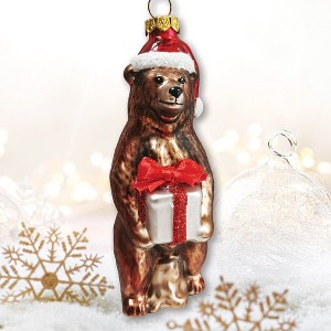 Grizzly Bear with Santa Hat and Gift Glass Christmas Ornament| OrnamentallyYou - 1 of 4