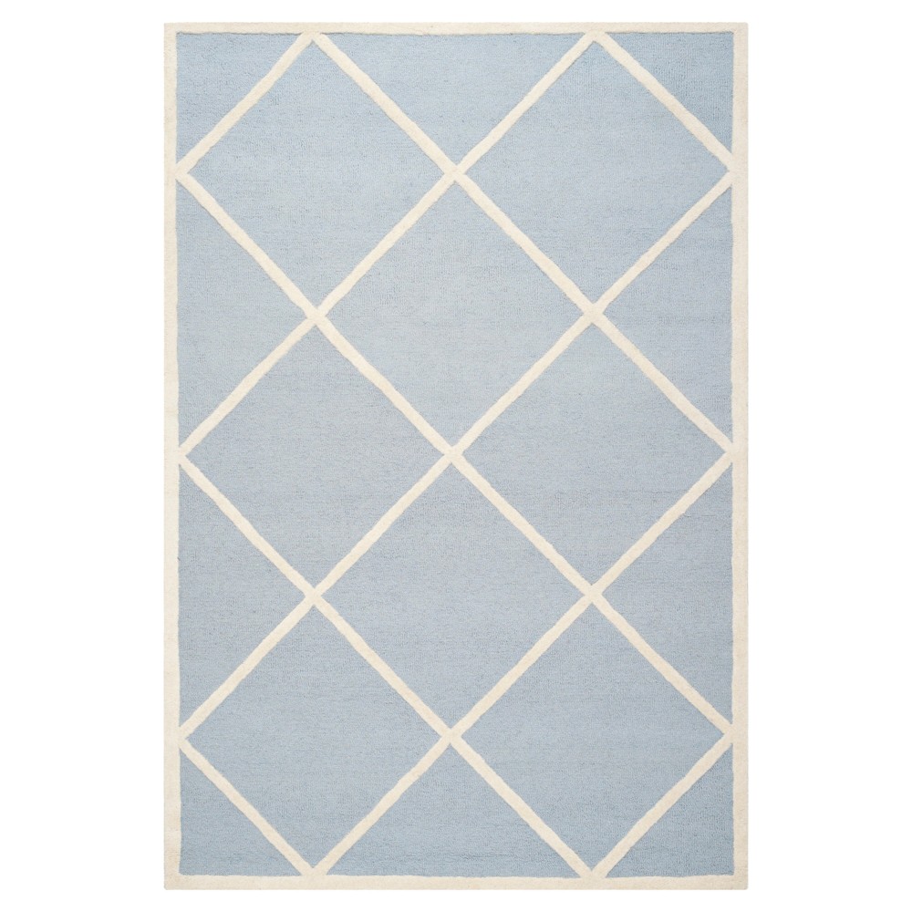 6'x9' Reave Geometric Area Rug Light Blue/Ivory - Safavieh