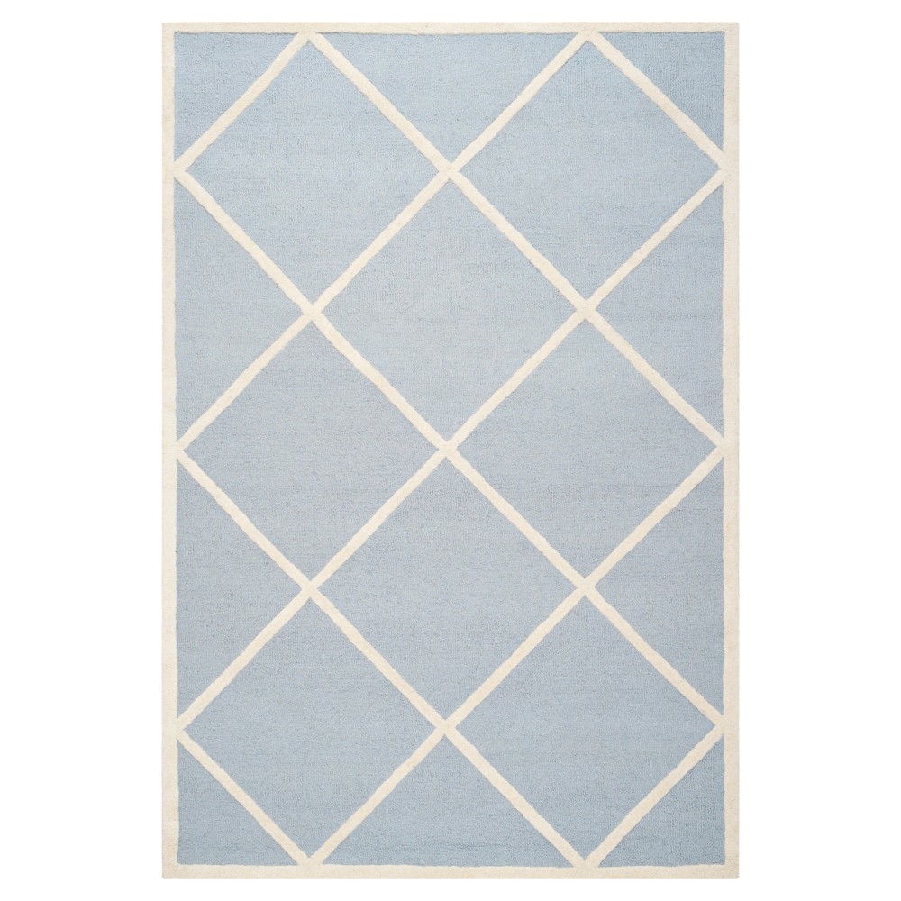 6'x9' Reave Geometric Area Rug Light Blue/Ivory - Safavieh