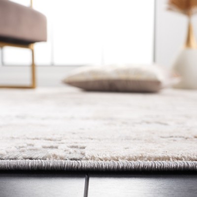 Gray and Beige Abstract 8' x 10' Synthetic Area Rug