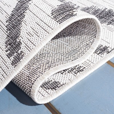 Ivory and Black Zebra Print Indoor/Outdoor Area Rug