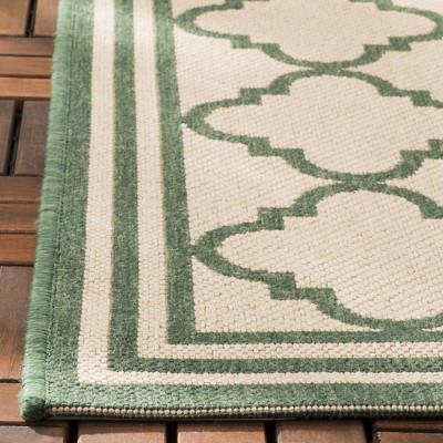 Cream and Green Synthetic Stain-Resistant Indoor/Outdoor Rug