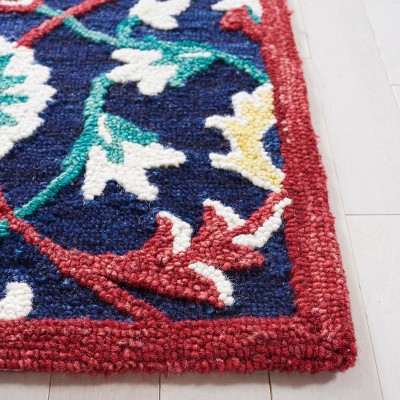 Handmade Blossom Red Floral Wool Area Rug - 8' x 10'