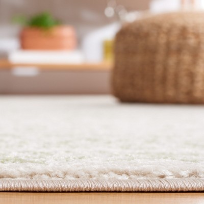 Ivory and Sage Hand-knotted Round Synthetic Area Rug