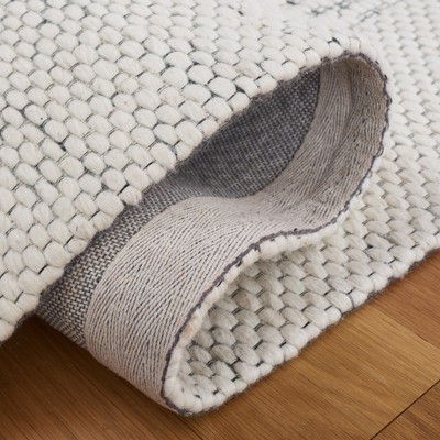 Ivory and Green Handwoven Wool 6' x 9' Area Rug